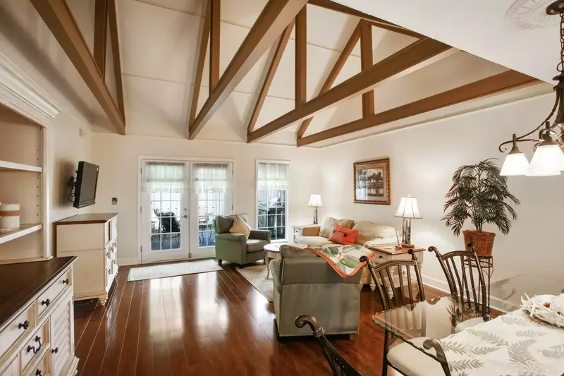 Open and Airy Living & Dining Rooms with Cathedral Ceilings