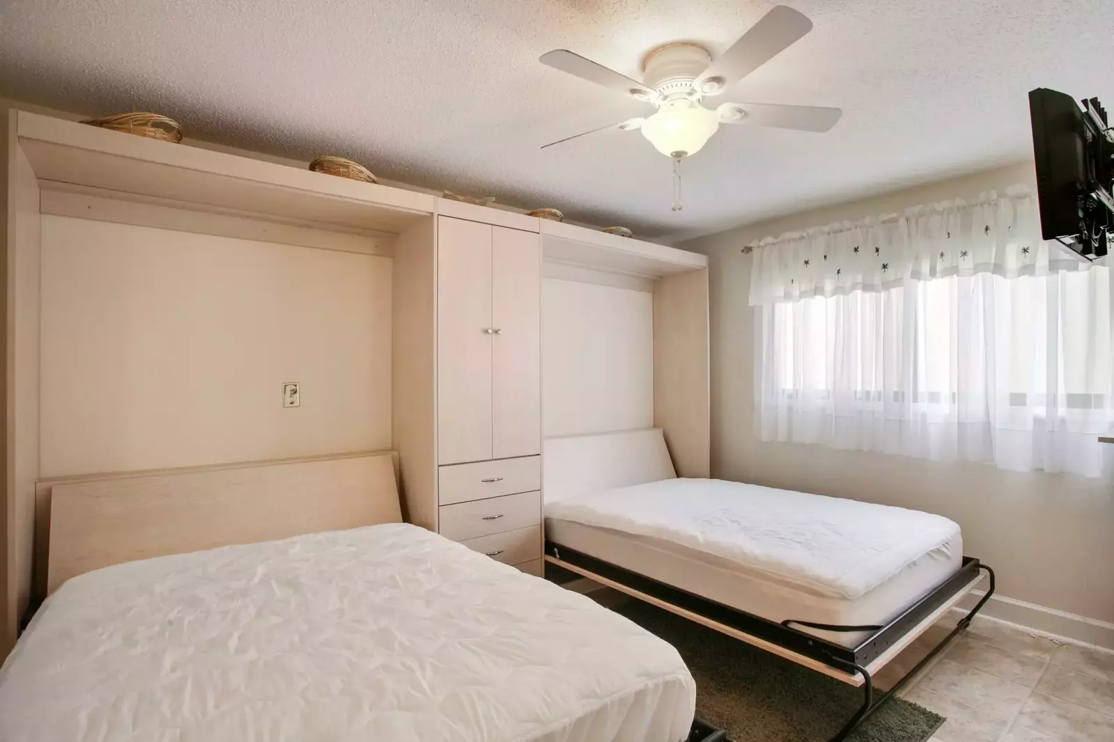Full Size Murphy Beds  easily fold up or down for convenience and extra space