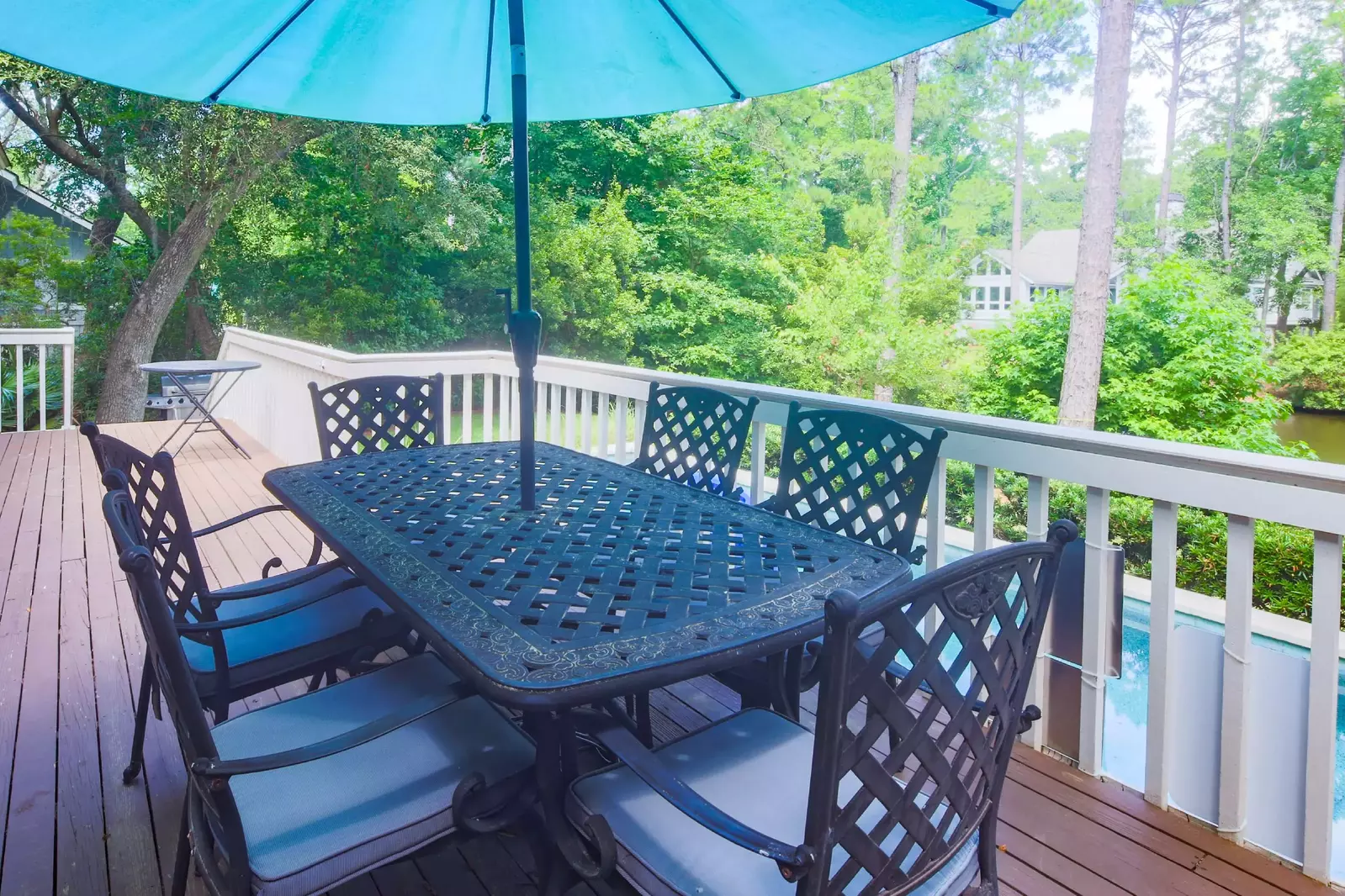 The home's outdoor spaces -- with private pool & lagoon views -- are every bit as fabulous as the home's interior spaces.