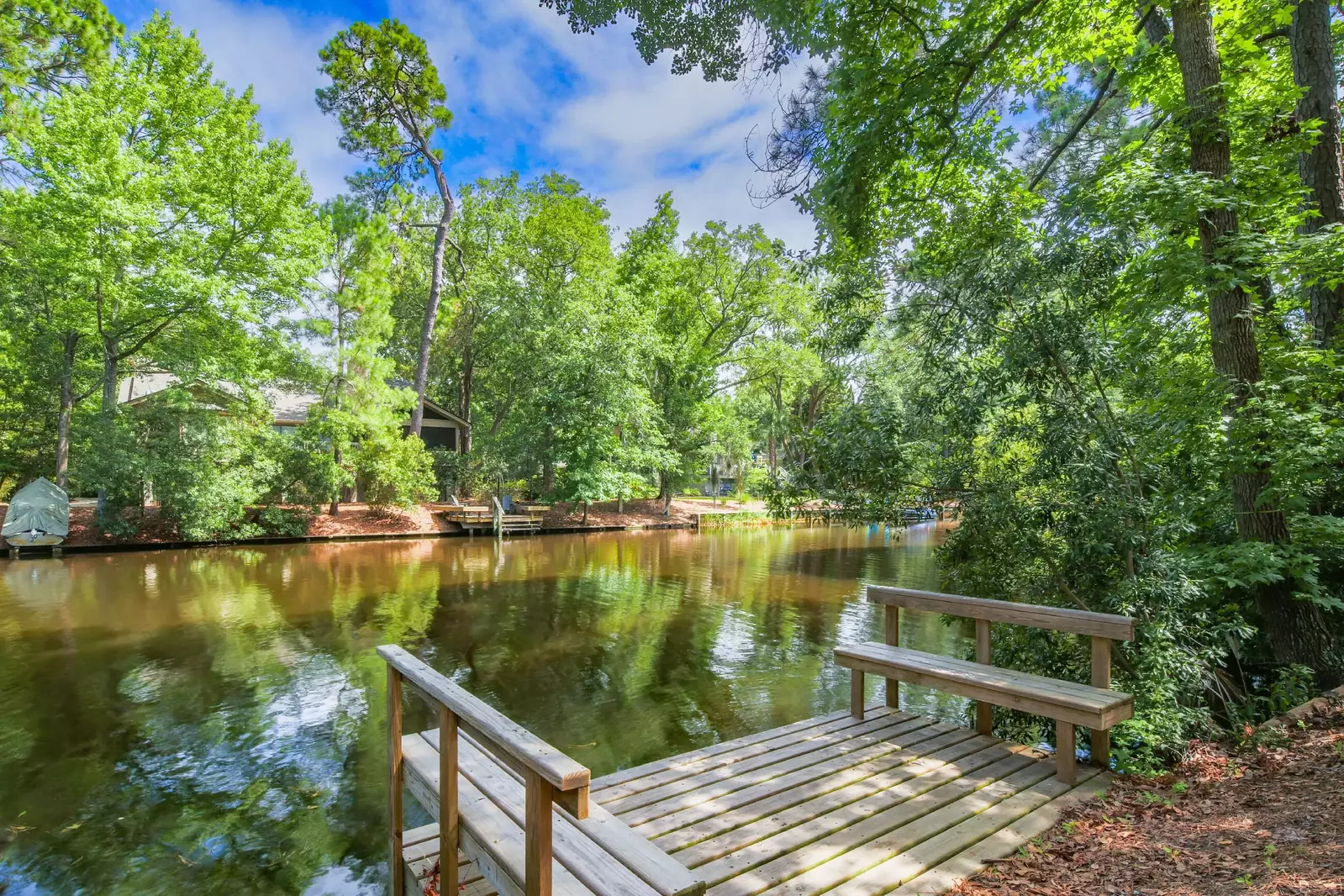 There is a private dock in the backyard for launching your canoe into the lagoon.