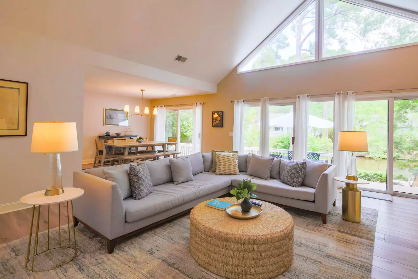 This room receives lovely natural light through the many windows on the back wall of the home.