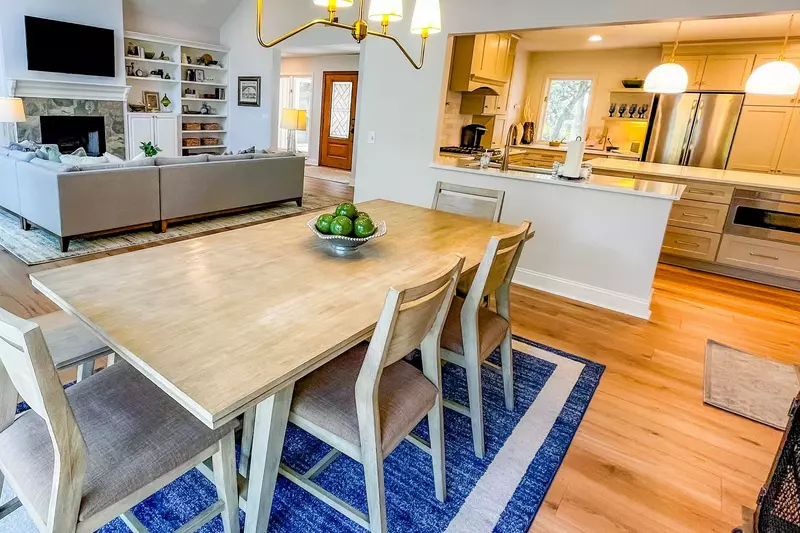 The dining area also flows into the kitchen.