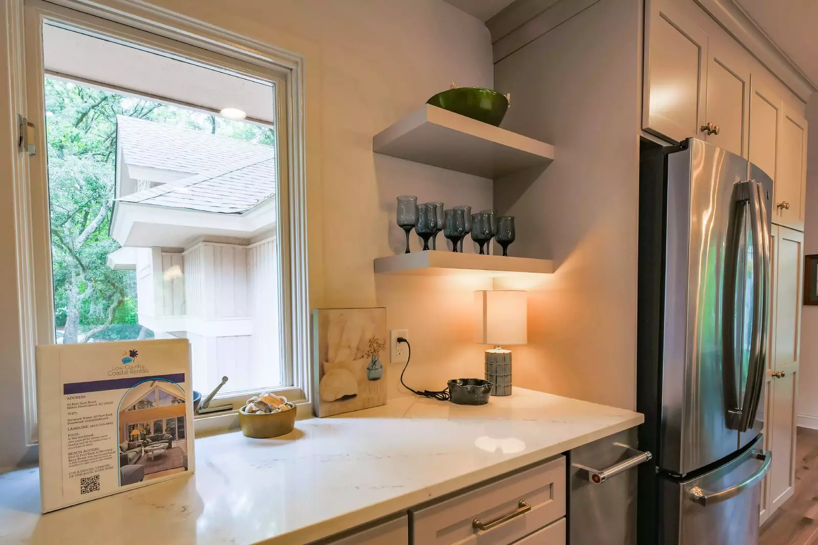 The kitchen also has granite countertops.
