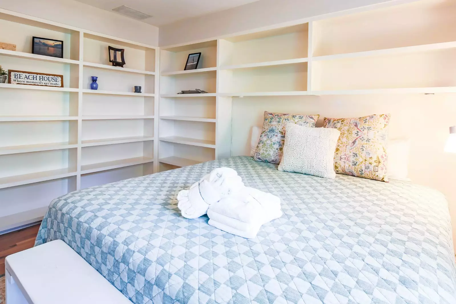 There is plenty of room on the built-in bookshelves to store your personal belongings.