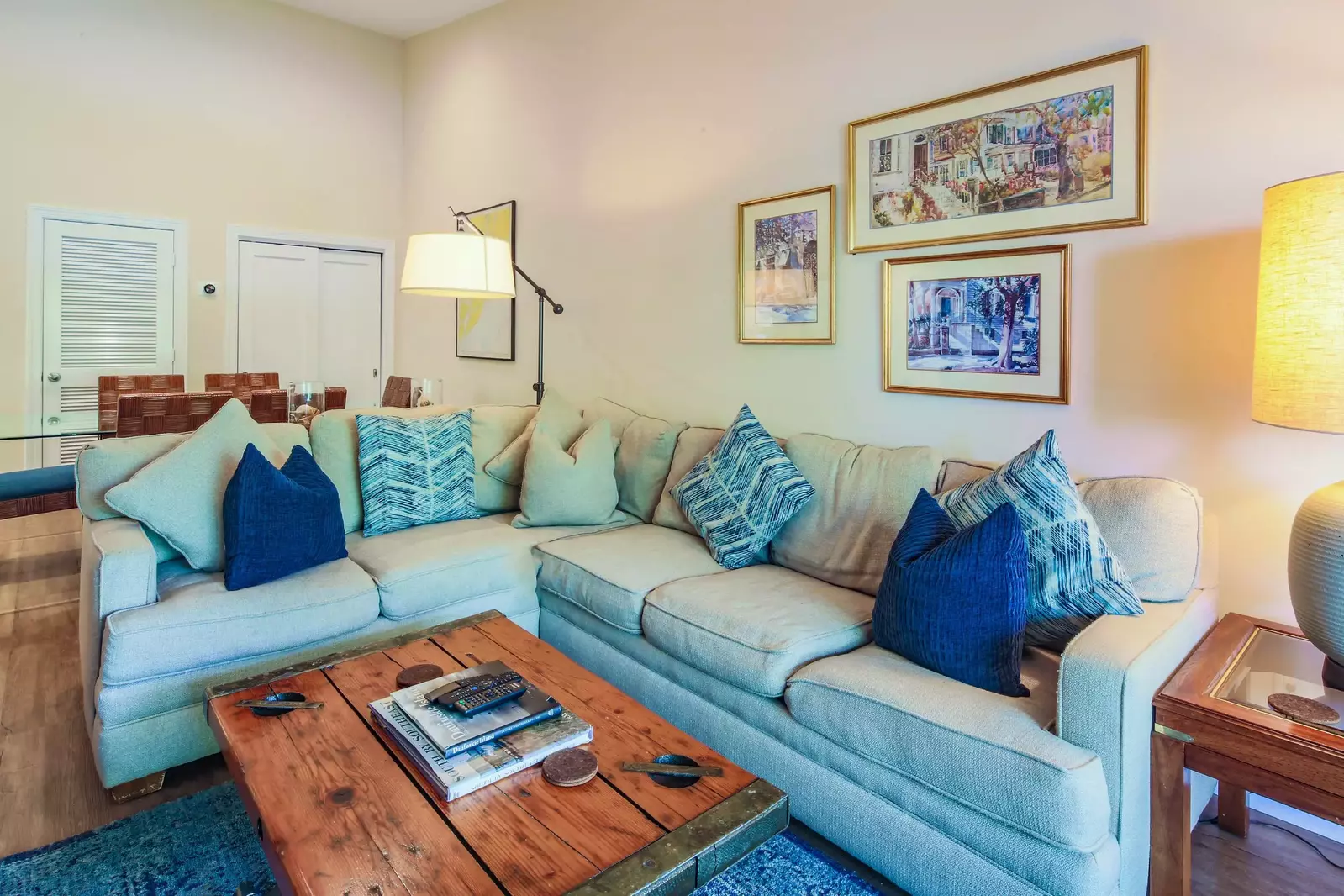 The villa has been decorated in a coastal mix of blues, greens, yellow, beiges and browns.