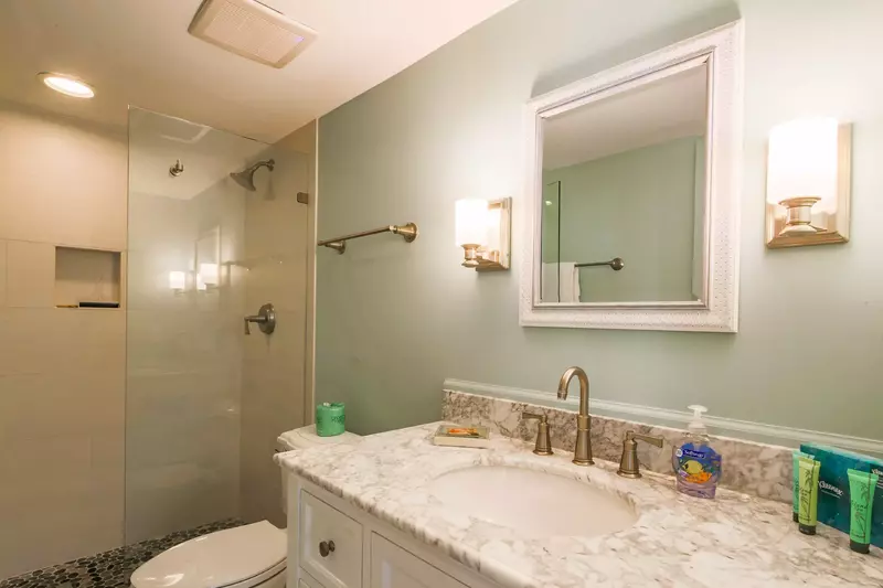 The master en suite also has a beautifully tiled walk-in shower.