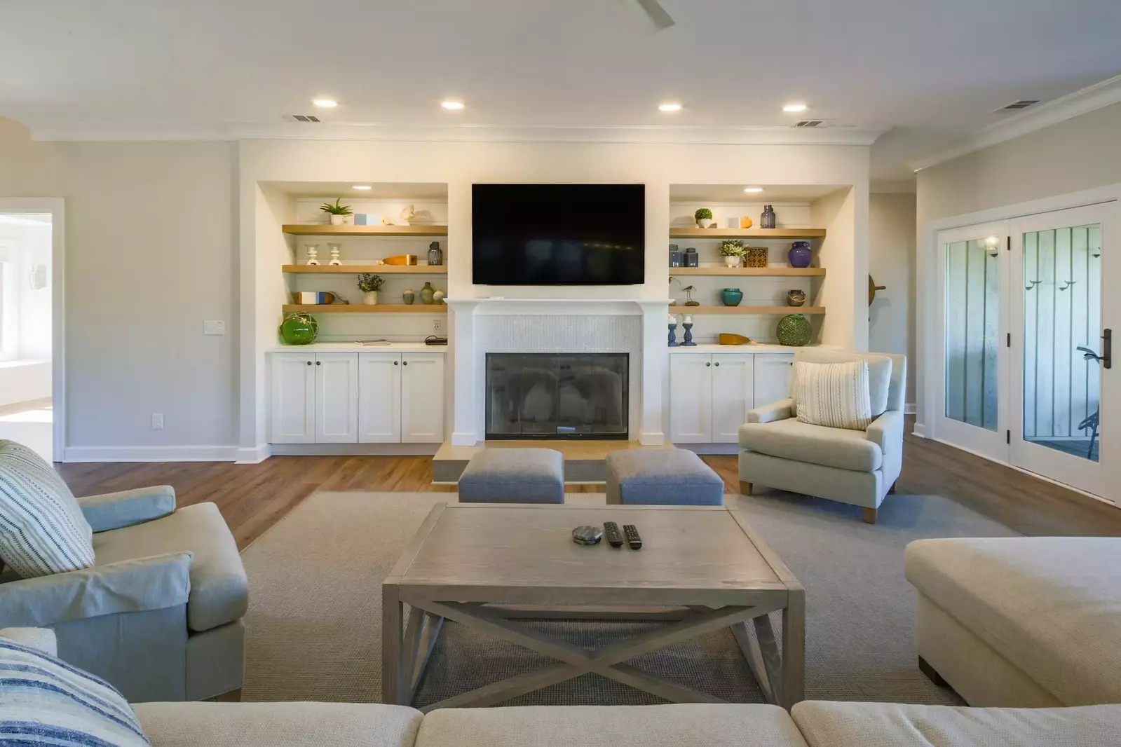 There's plenty of seating in the living room for your family to gather together.