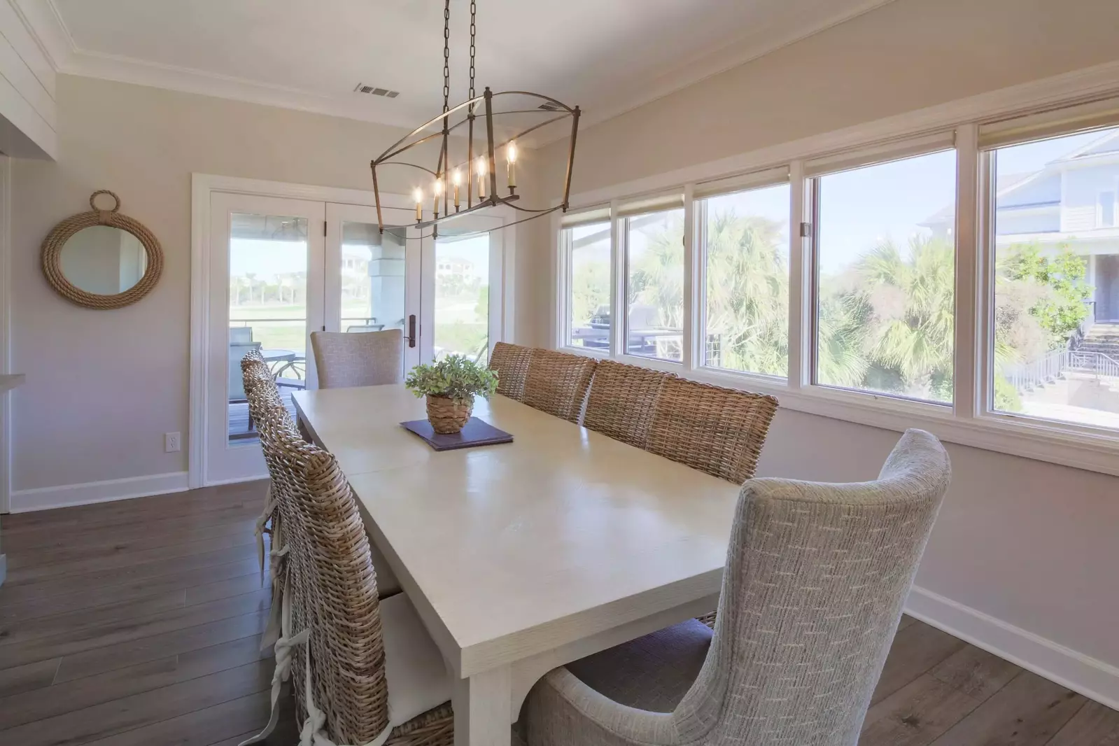 The dining table, which seats 10, is located just inside the door from the covered back deck.
