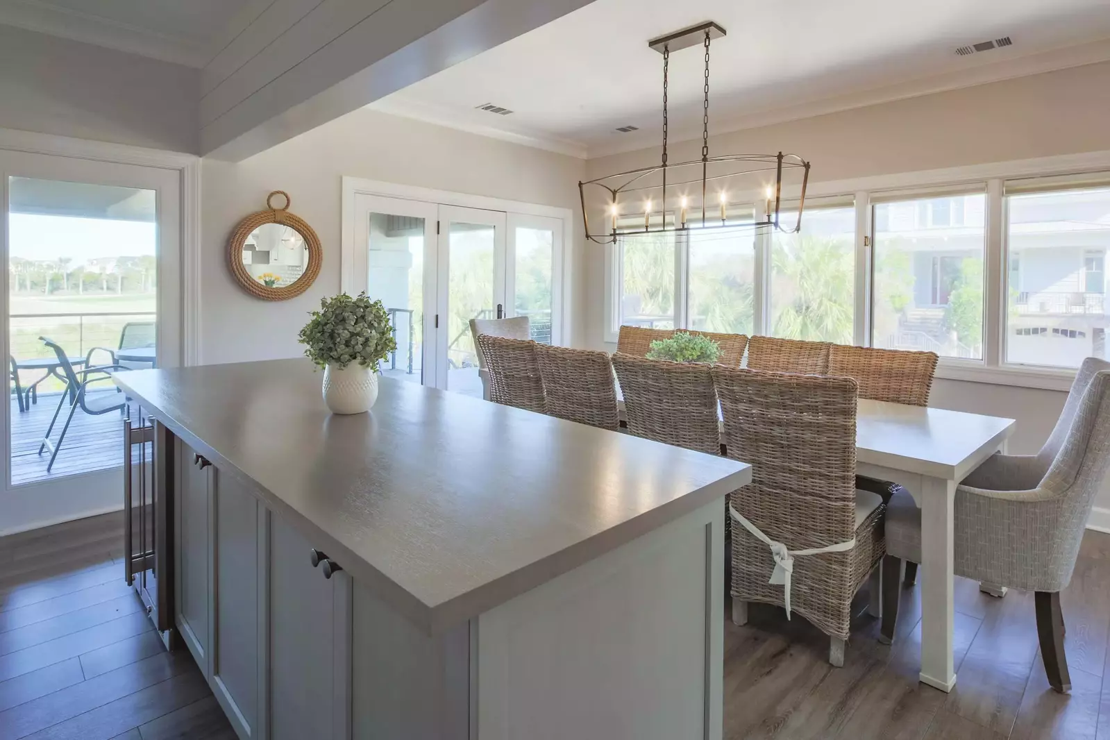 This island with a drink refrigerator separates the dining area from the living room.