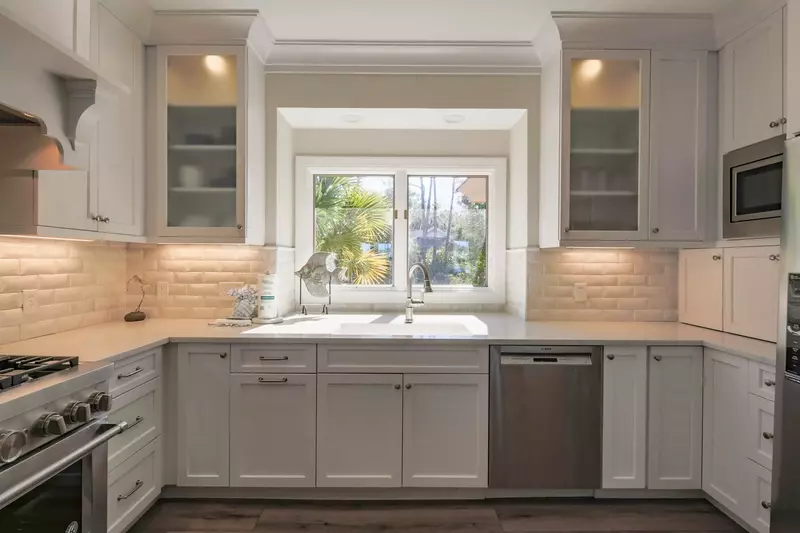 This picture window over the kitchen sink provides wonderful natural light.
