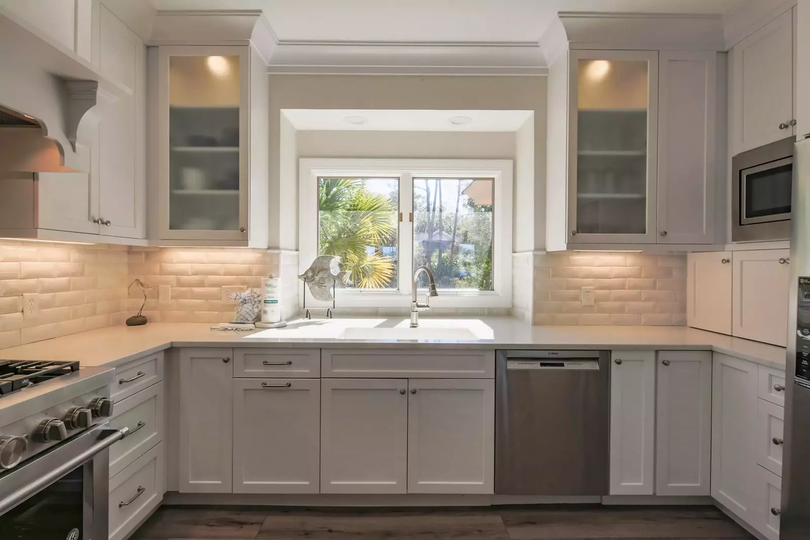 This picture window over the kitchen sink provides wonderful natural light.