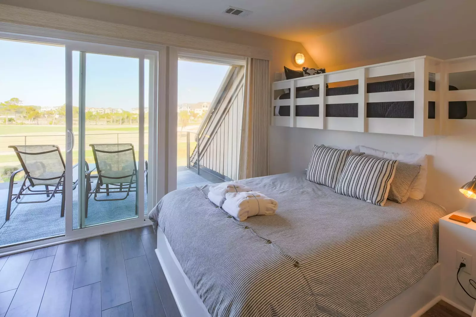 The bunk bedroom also has sliding door access to the second floor outdoor balcony.