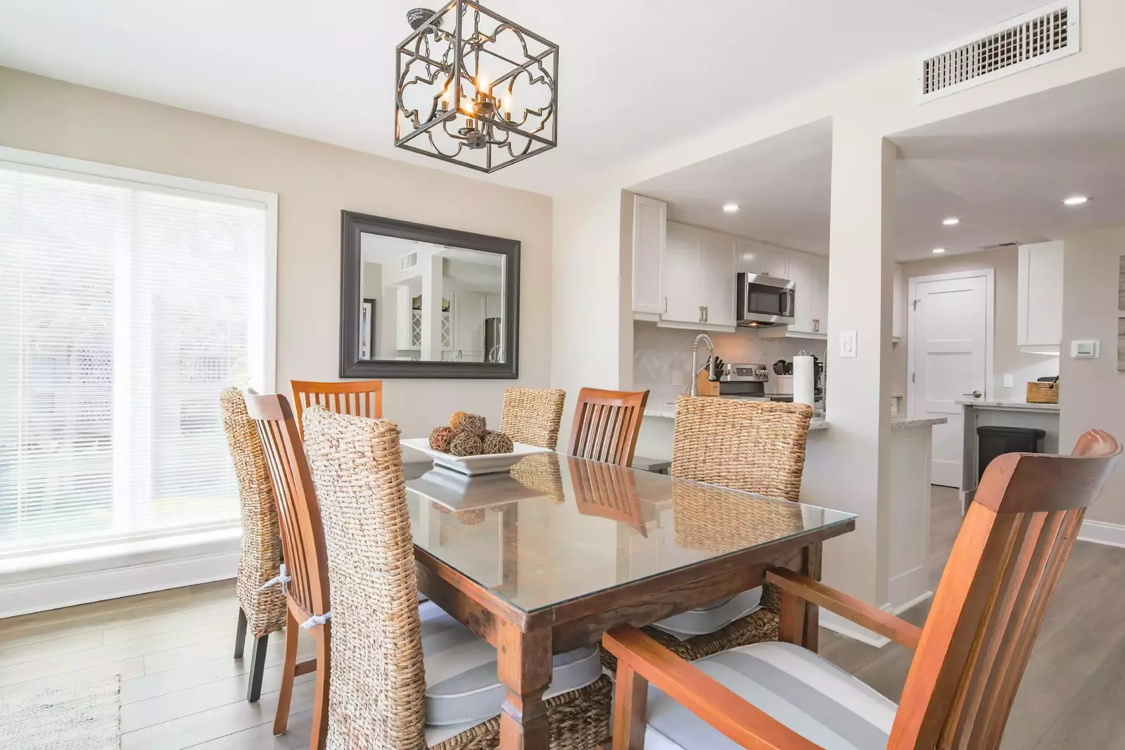 The dining area, which seats 8, opens into the renovated kitchen.