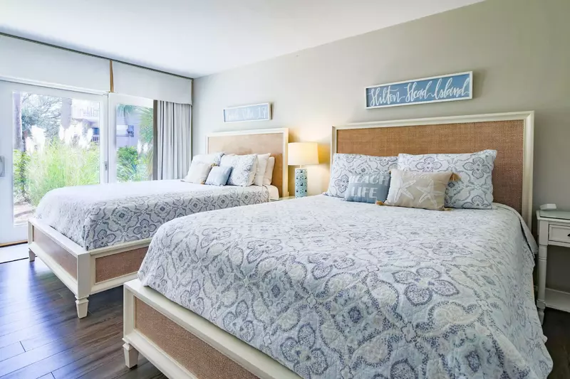 The queen suite, which is located on the first floor, features two queen beds.