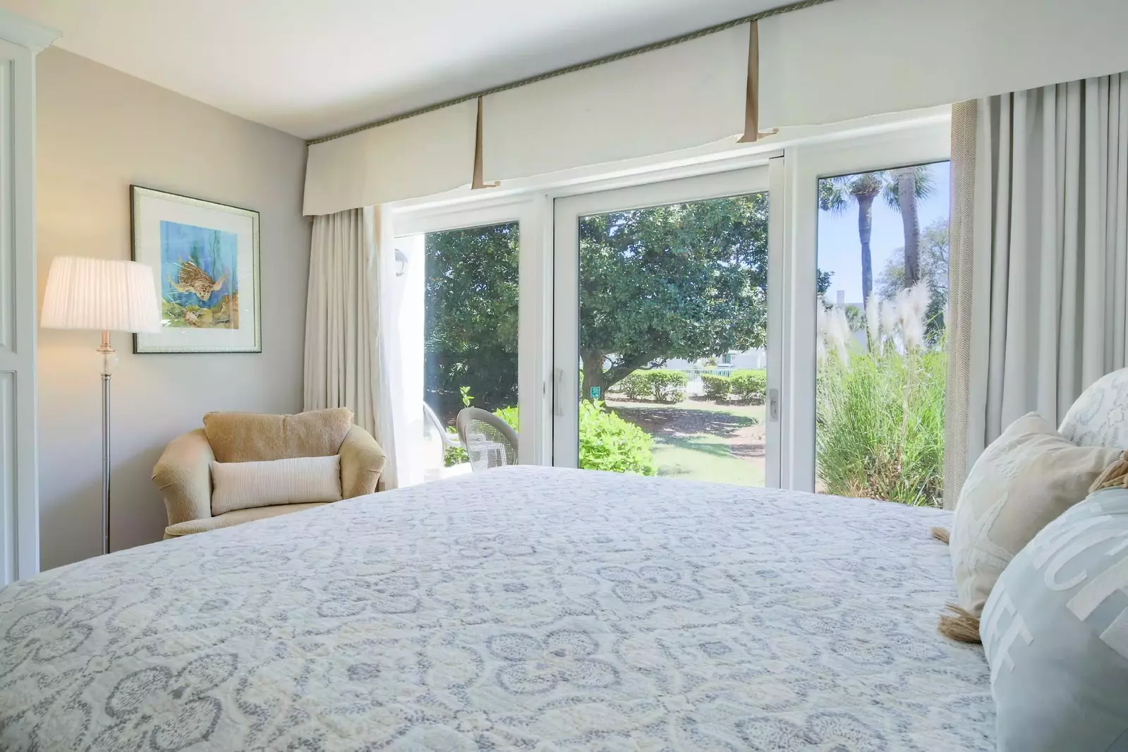 The queen suite has sliding door access to the back patio.
