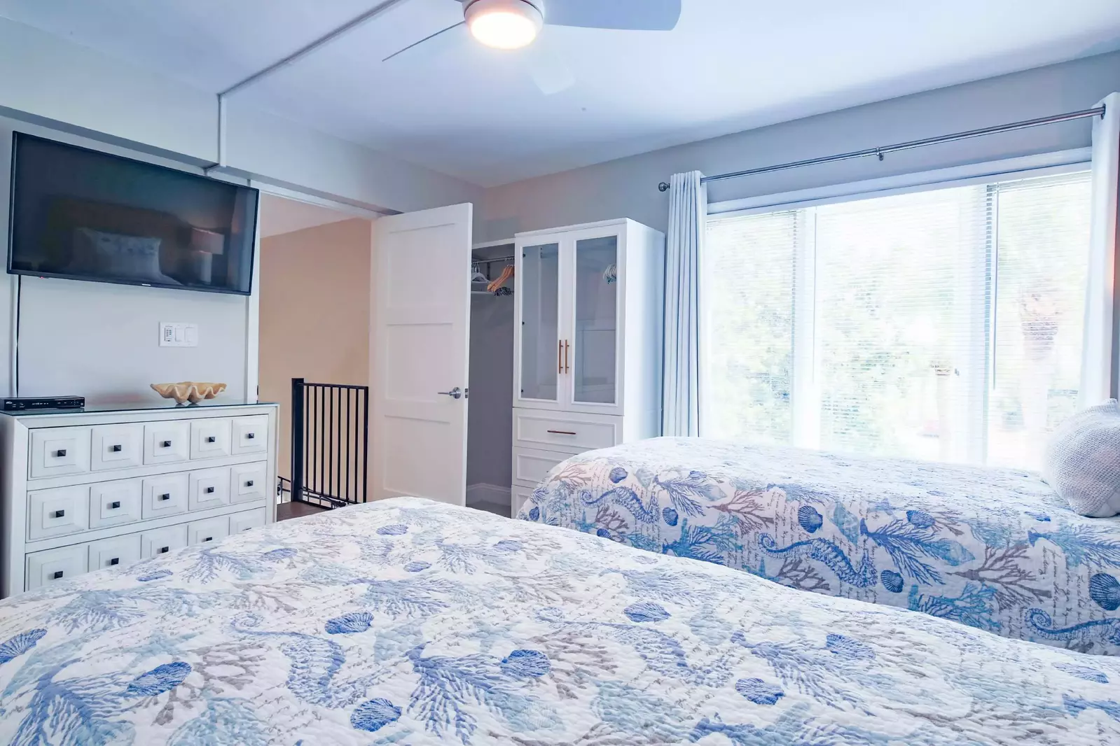 The twin suite is located at the top of the spiral staircase from the living room.