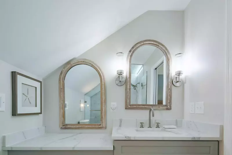 This en suite bathroom has a spacious vanity.