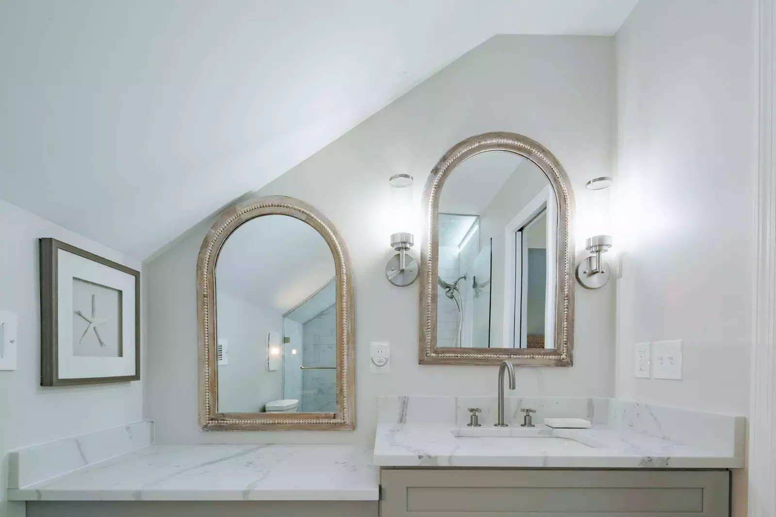 This en suite bathroom has a spacious vanity.