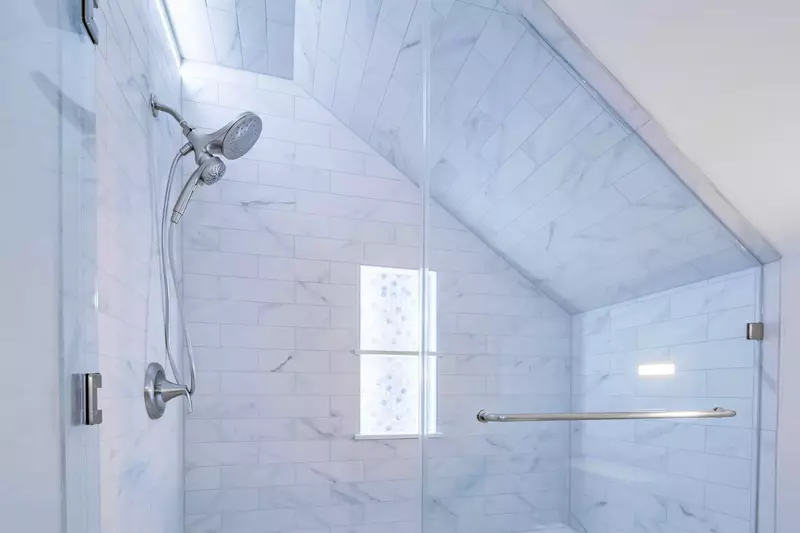 There is also a tiled, walk-in shower.