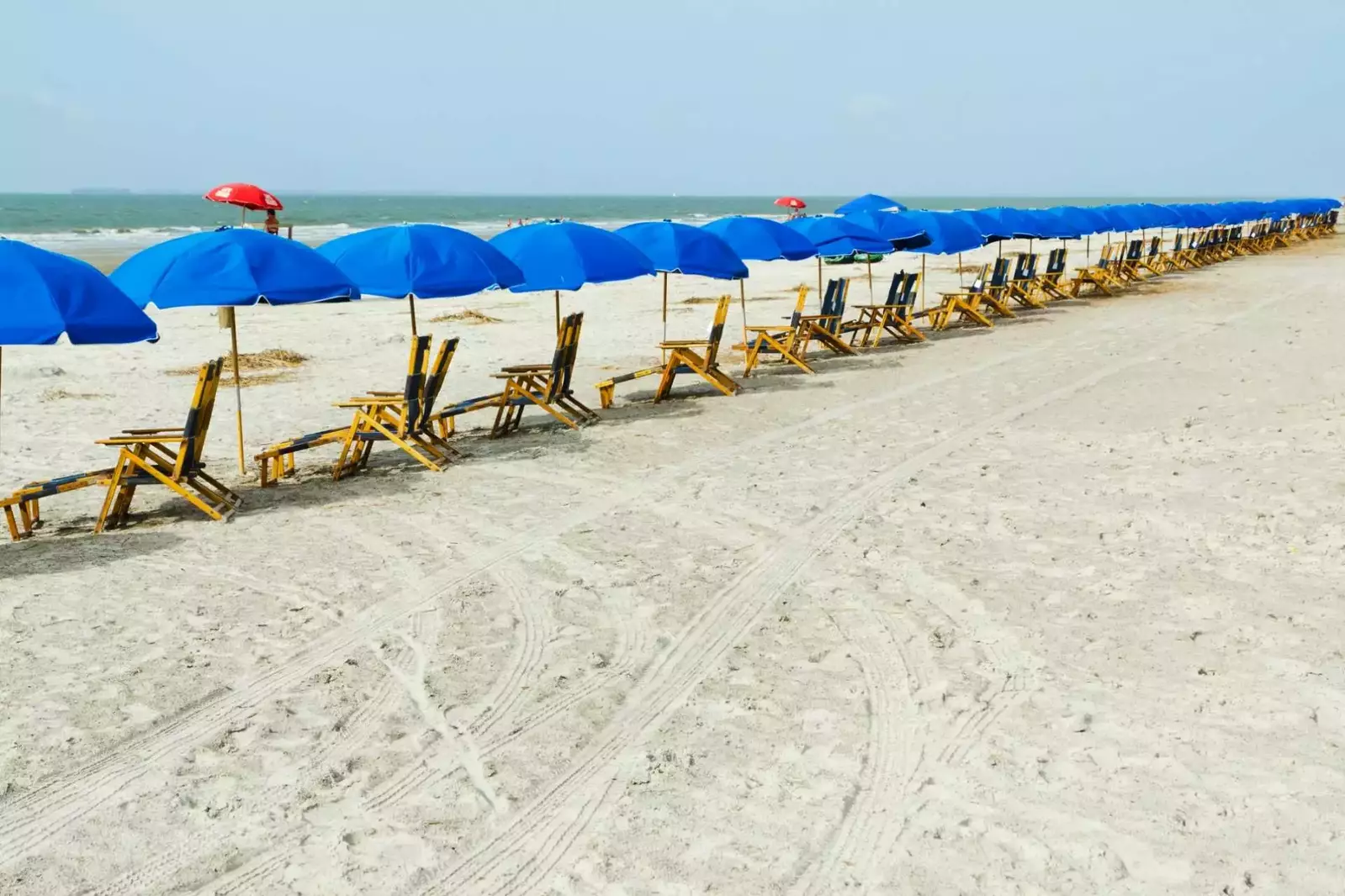 Beach Chairs & Umbrellas available for rent - set up everyday for you!