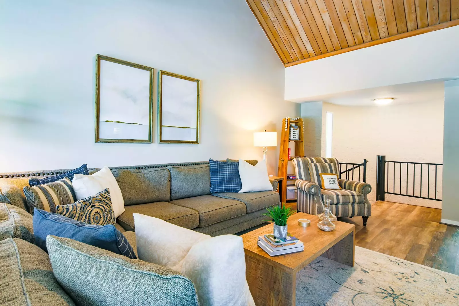 The living room is located at the top of the spiral staircase on the home's second floor.
