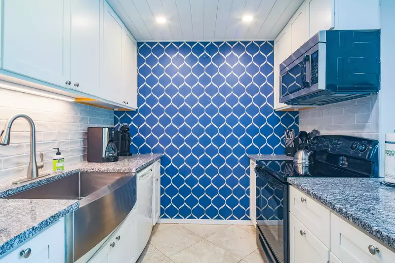 There is plenty of room within the spacious kitchen to prepare your family's meals.