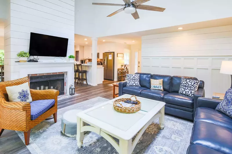 When you enter the front door, you'll find the living room, kitchen and dining area.