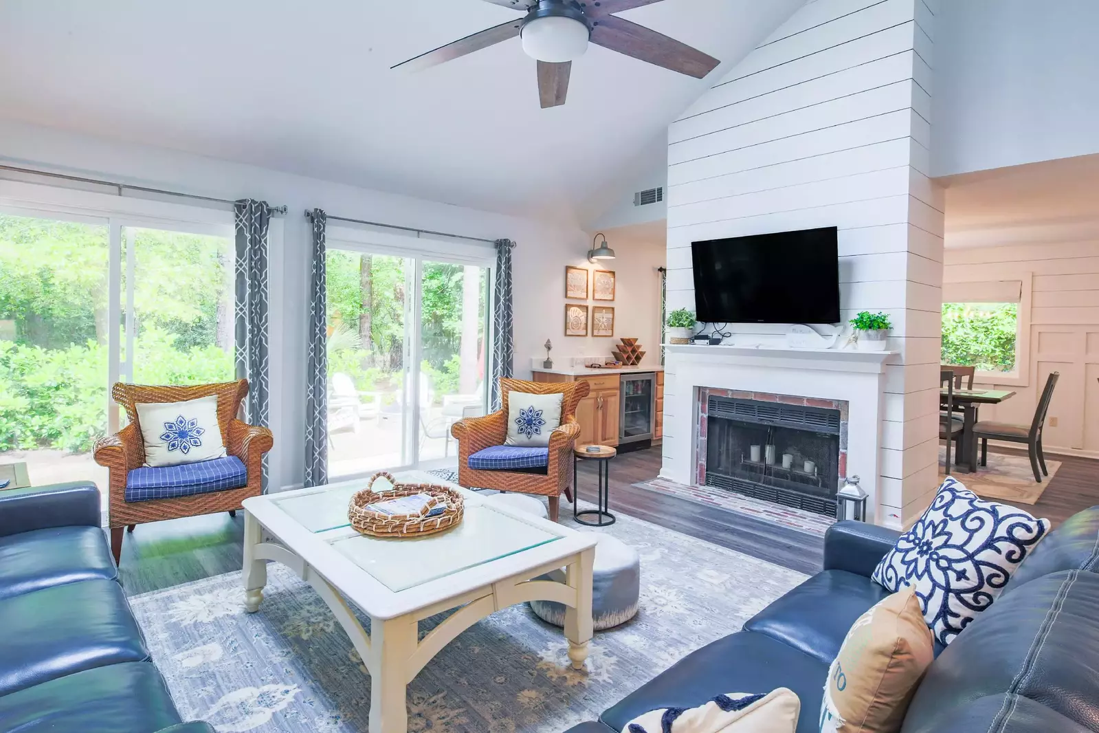 The living room also opens onto the backyard oasis through these sliding glass doors.