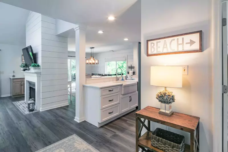 The kitchen flows into the entryway of the home.