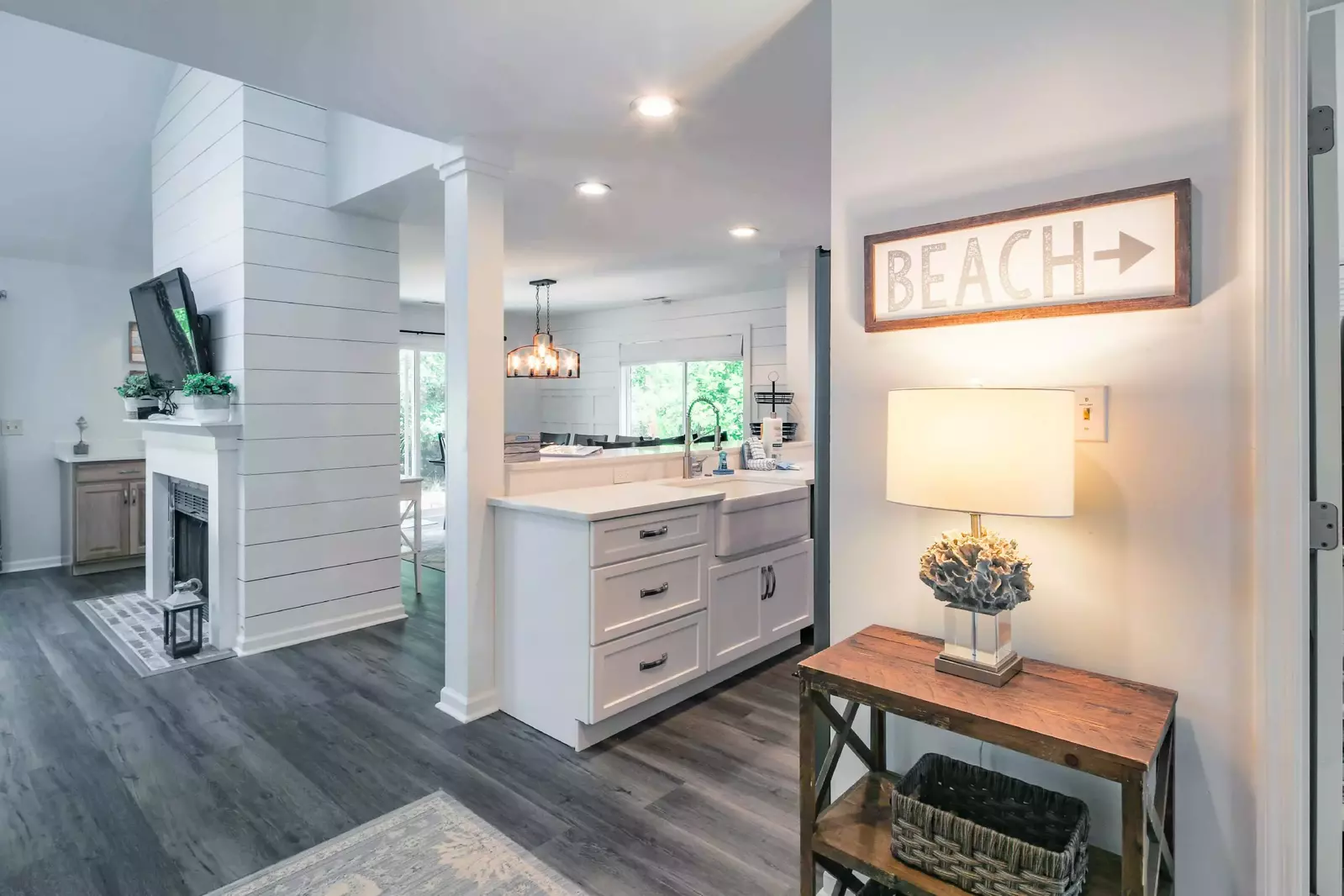 The kitchen flows into the entryway of the home.