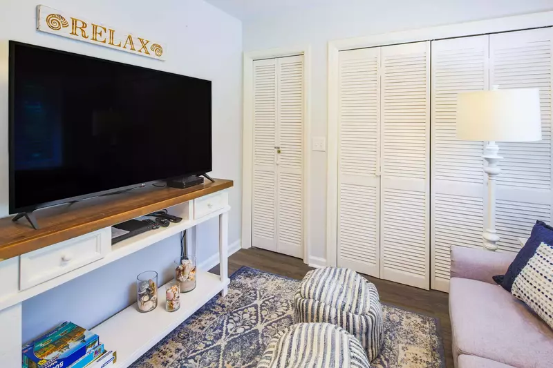 The den also has a large screen TV, puzzles & games.