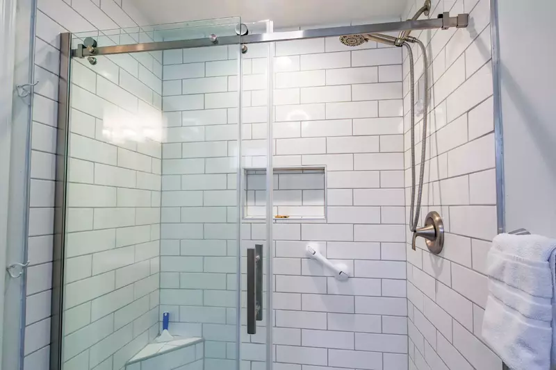 There is also a beautifully tiled, walk-in shower in tne en suite bathroom.