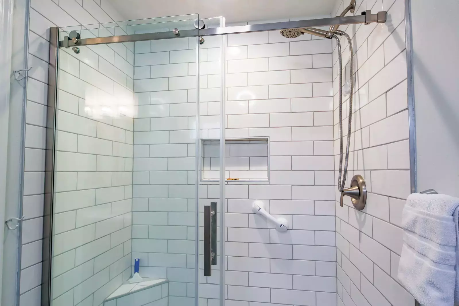 There is also a beautifully tiled, walk-in shower in tne en suite bathroom.