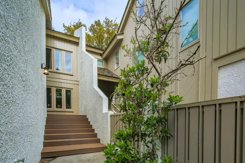Follow these stairs to the front door of On Beach Time.