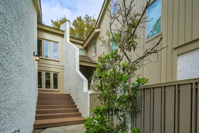 Follow these stairs to the front door of On Beach Time.