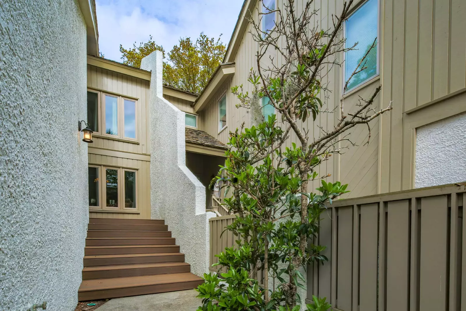 Follow these stairs to the front door of On Beach Time.
