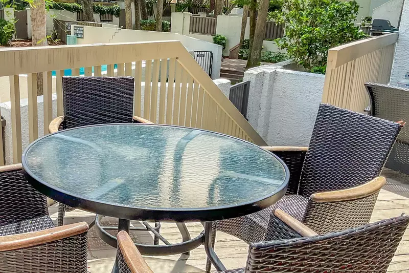 Follow these stairs off the back deck to find the access to the community pool.