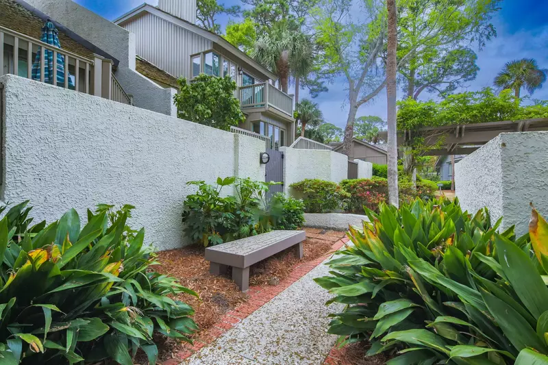 Take the stairs from the back porch down to this path to the community pool.