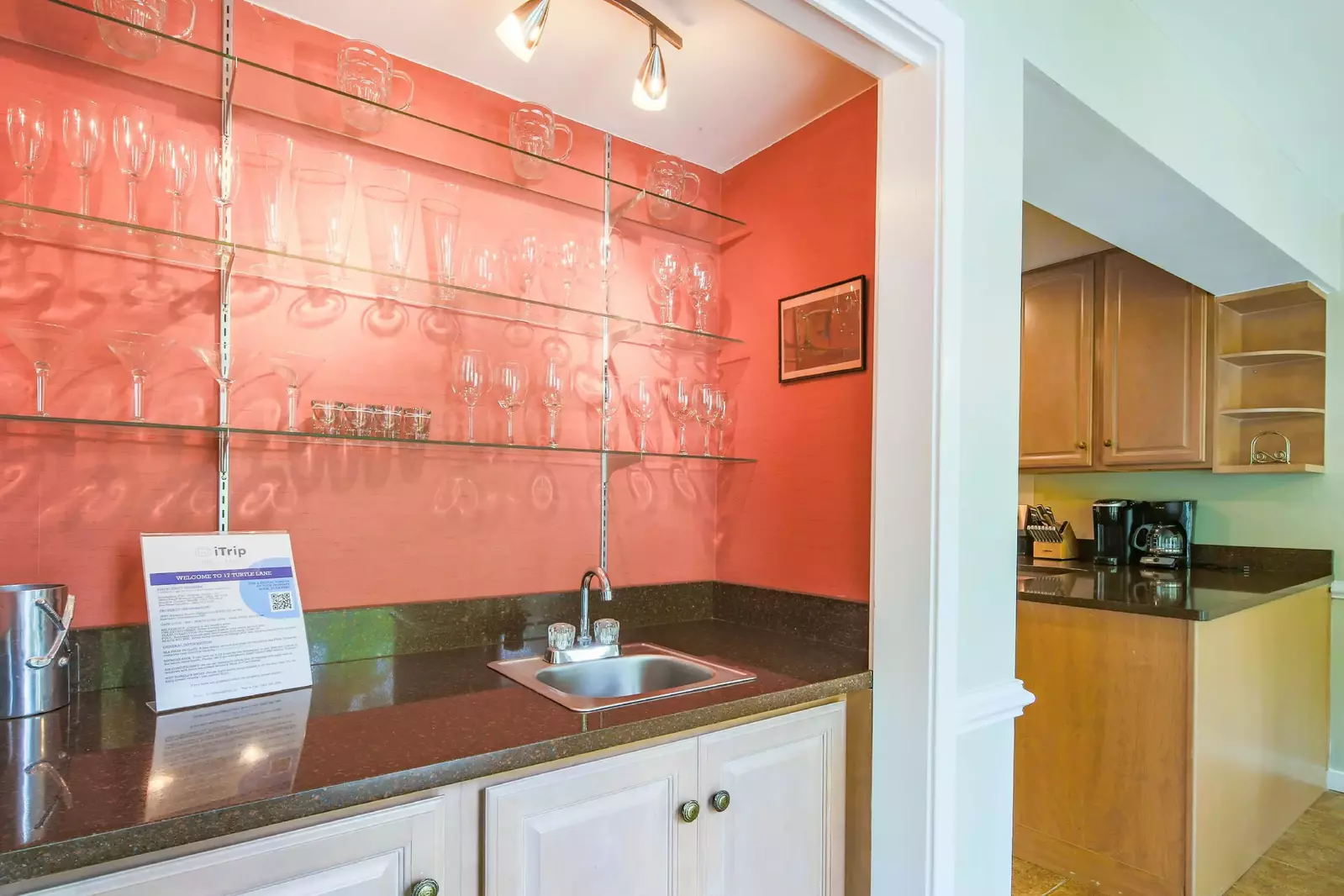 This wet bar is located in between the living room and kitchen.