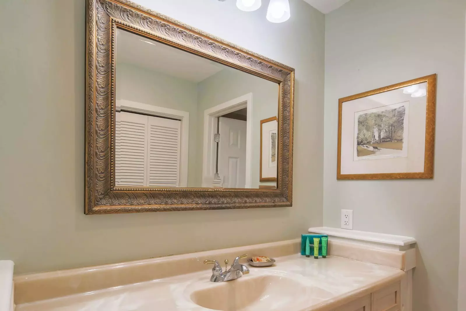 The en suite bathroom has two vanities.