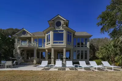 Summer Hygge features a private pool, sun deck and several porches.