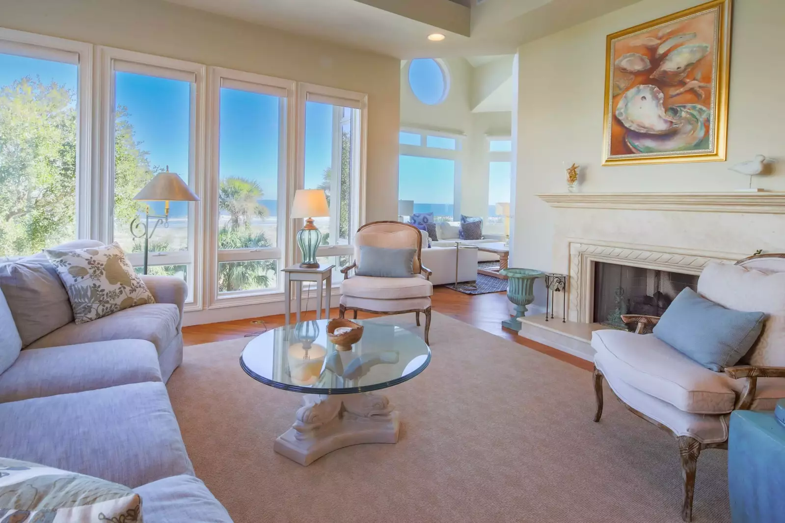 The upper level of the home features a living room, family room, kitchen and dining room.