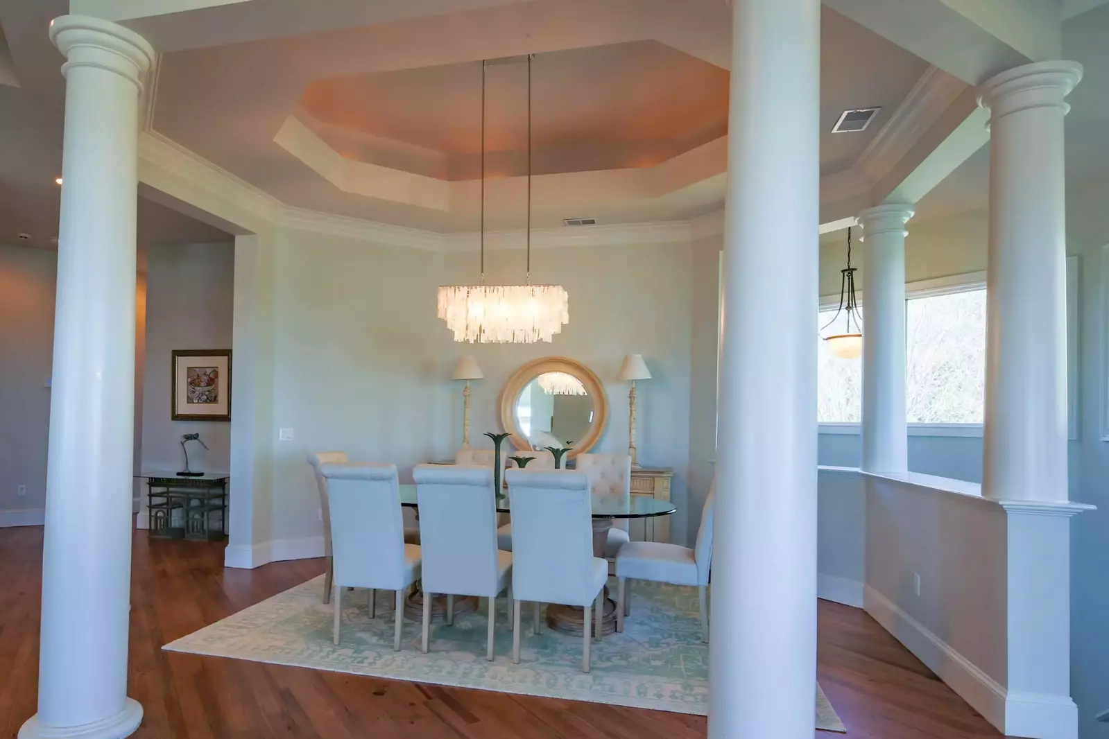 The dining table comfortably seats 8.