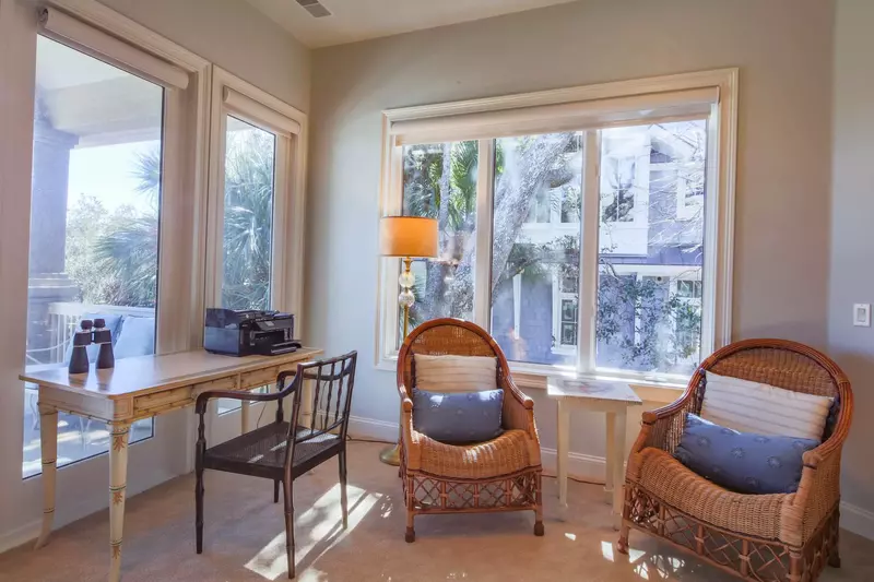 This seating area and desk is the perfect spot to enjoy your morning coffee.