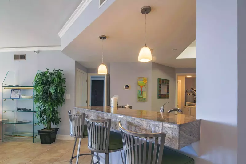 The guest suite is located off of the kitchen.