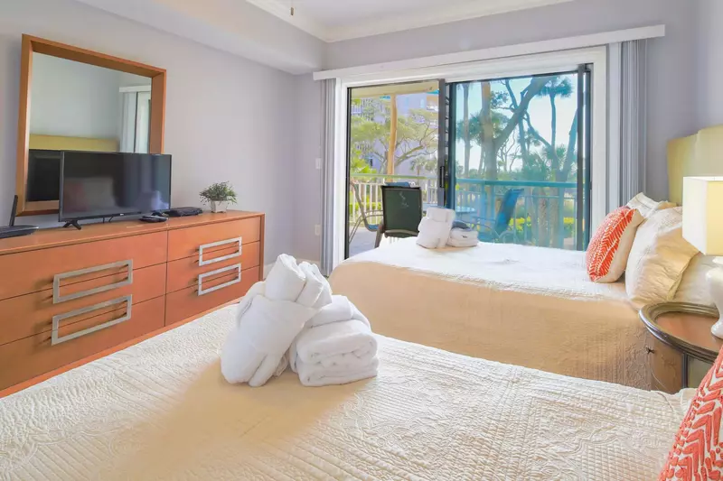 The guest suite also features sliding door access to the covered balcony with ocean views.