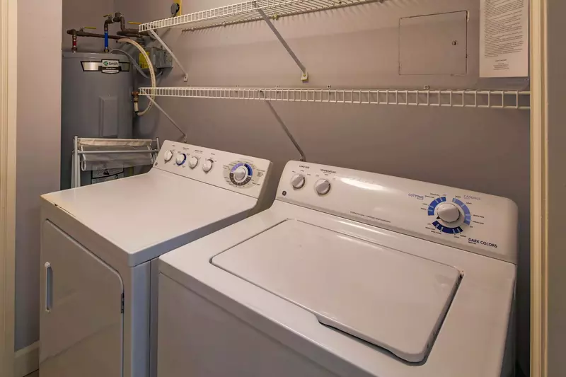 There is a full sized washing machine and dryer in the unit.