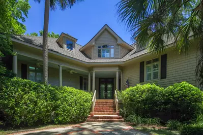 Oyster Catcher is a magnfiicent home with a grand staircase and front porch.