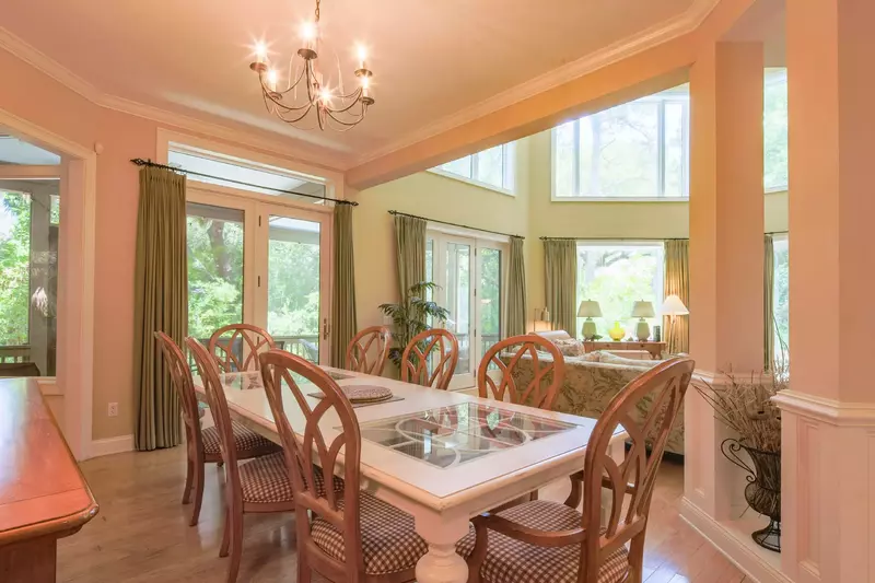 The dining table seats 8 and there is an additional dining table and stools in the kitchen.
