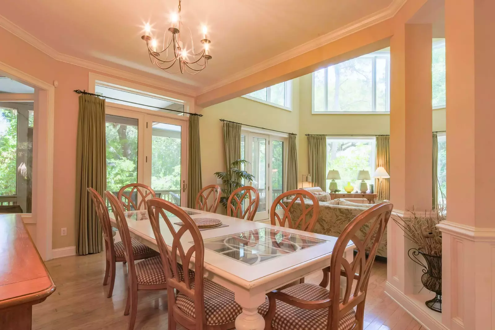 The dining table seats 8 and there is an additional dining table and stools in the kitchen.